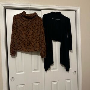 One brown and black polkadot blouse and black cardigan